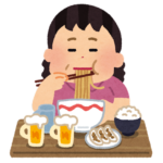 食べ過ぎる女性